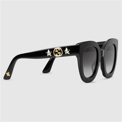 Gucci Lunettes de soleil rondes en acétate avec étoile .